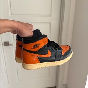 Air Jordan High-Top Sneakers in Black and Orange